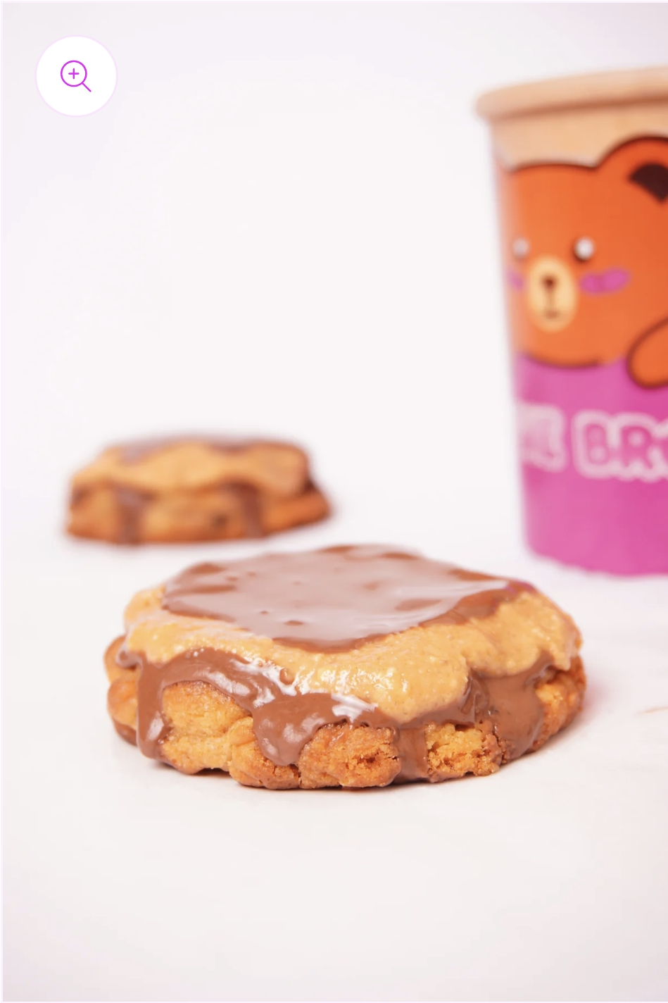 Peanut Buttercup Cookie broken open showing the peanut-buttercup filling