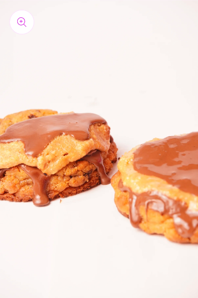 Peanut Buttercup Cookie cross-section showing the peanut-buttercup filling between the layers