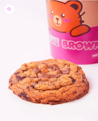 Close-up of Brown Butter Chocolate Cookie showing gooey melted chocolate and pink sea salt topping